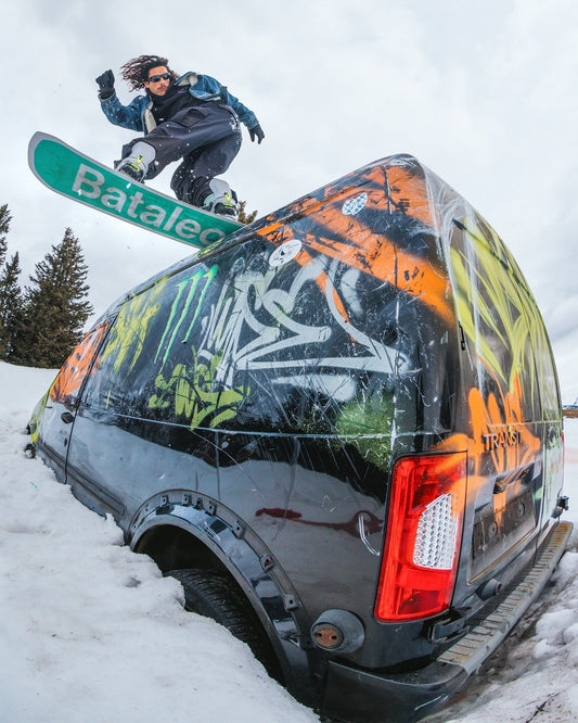 Snowboarder performing grind using Bataleon snowboards 2025/2026